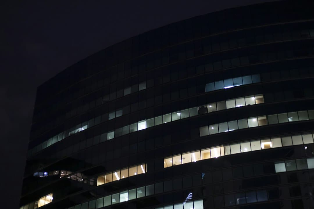 An office building lit up after hours.